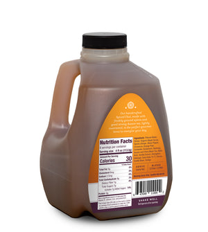 Spiced Chai 32 oz bottle back label brewed spicy chai Assam black tea ginger cardamom cinnamon black pepper cloves astragalus gotu kola ginkgo orange peel coriander vanilla bean honey organic maple syrup