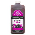 Hibiscus Chai 64 oz bottle front label brewed organic hibiscus cinnamon cardamom black pepper cloves astragalus gotu kola coriander vanilla bean honey